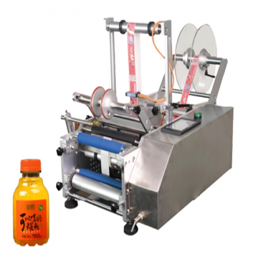半自動(dòng)果汁瓶貼標(biāo)機(jī)
